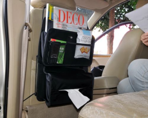 The back seat of tissue box, books and newspapers bags
